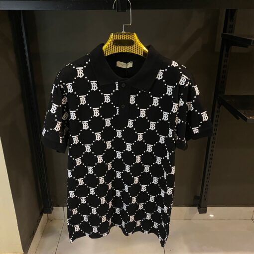 BURBERRY BLACK POLO ALL OVER WHITE PRINT