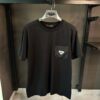 PRADA BLACK TSHIRT WHITE BADGE