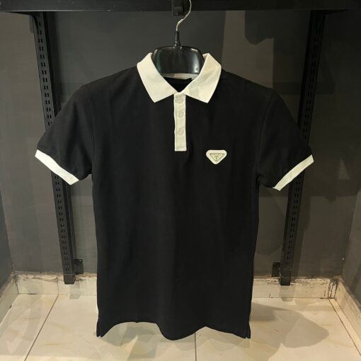 PRADA BLACK P0LO WHITE BADGE